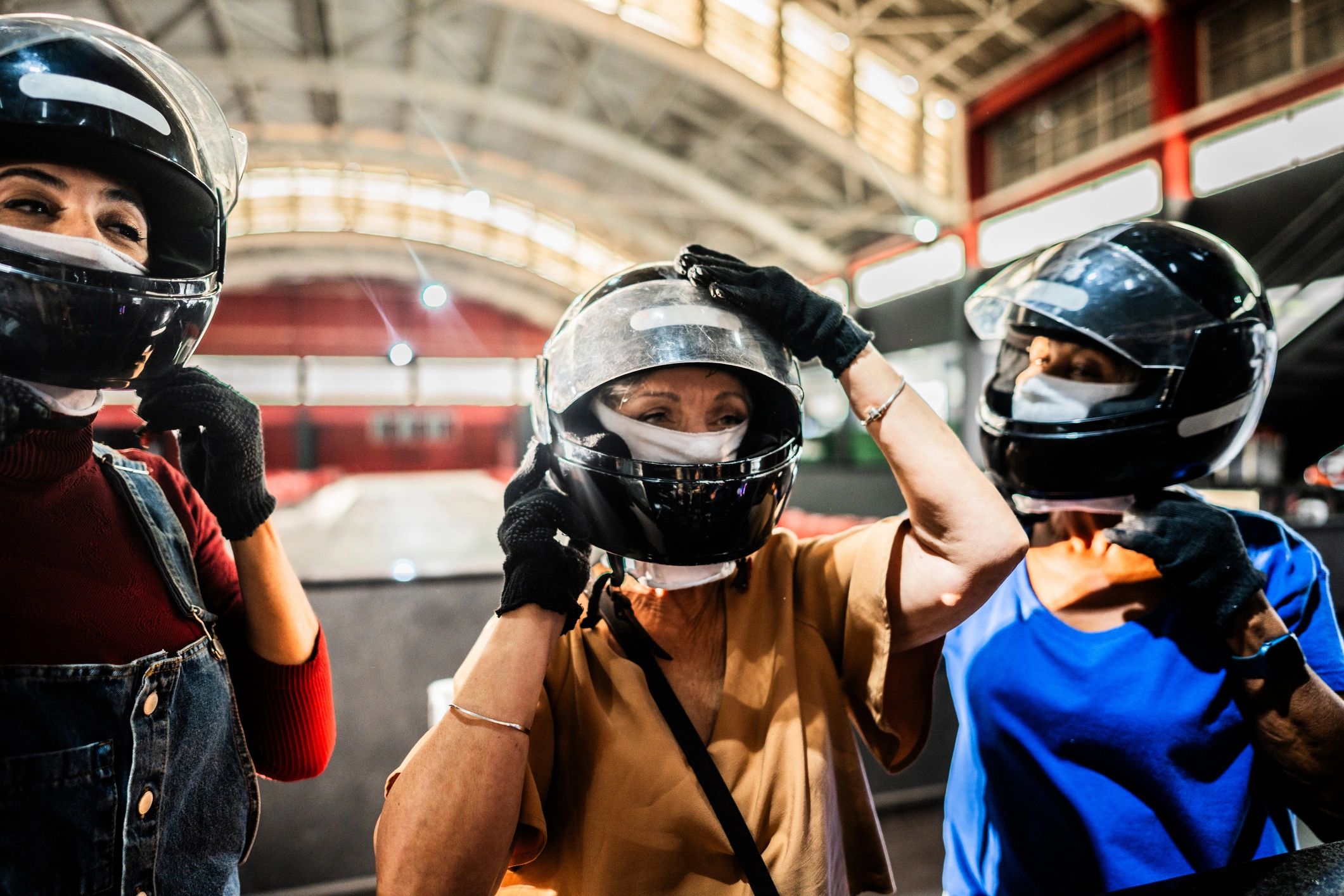 Drivers preparing at a kart track